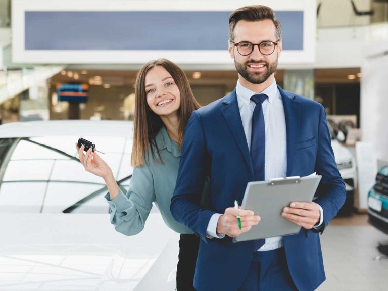 Woman happy and smiling for car leasing service with agent