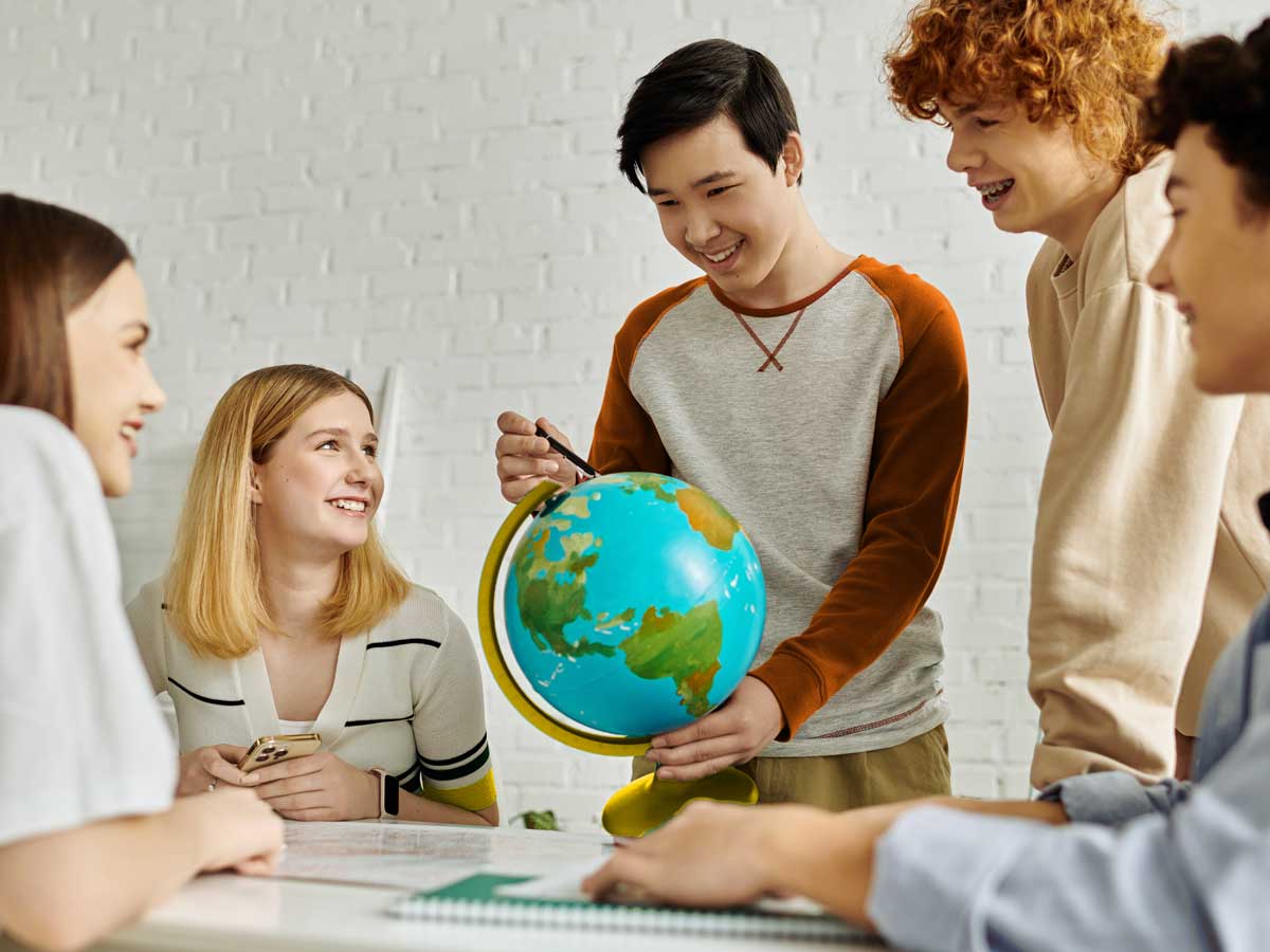 Language training in Thailand — children with a globe