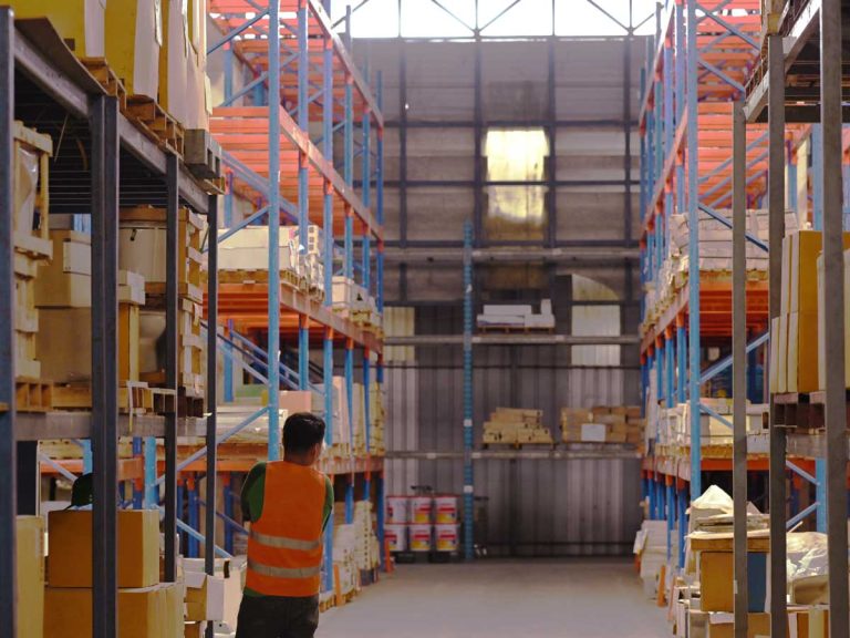 A man standing in a storage solutions units in the Philippines